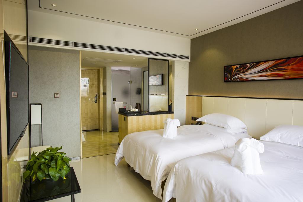 Lori Star Hotel Qionghai Chambre photo