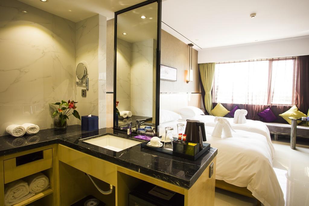 Lori Star Hotel Qionghai Chambre photo