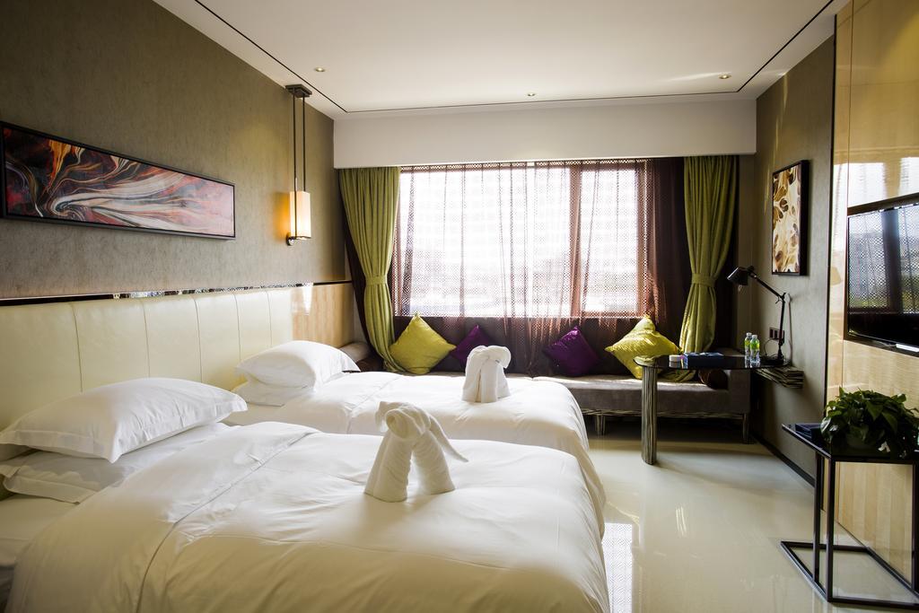 Lori Star Hotel Qionghai Chambre photo